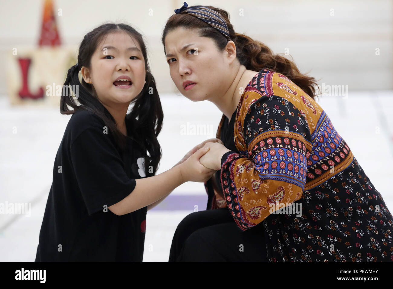 31st July, 2018. S. Korean actresses Ahn So-myung and Kim Ki-jung South  Korean actresses Ahn So-myung (L) and Kim Ki-jung, who star in the new  musical Matilda, perform during a publicity event