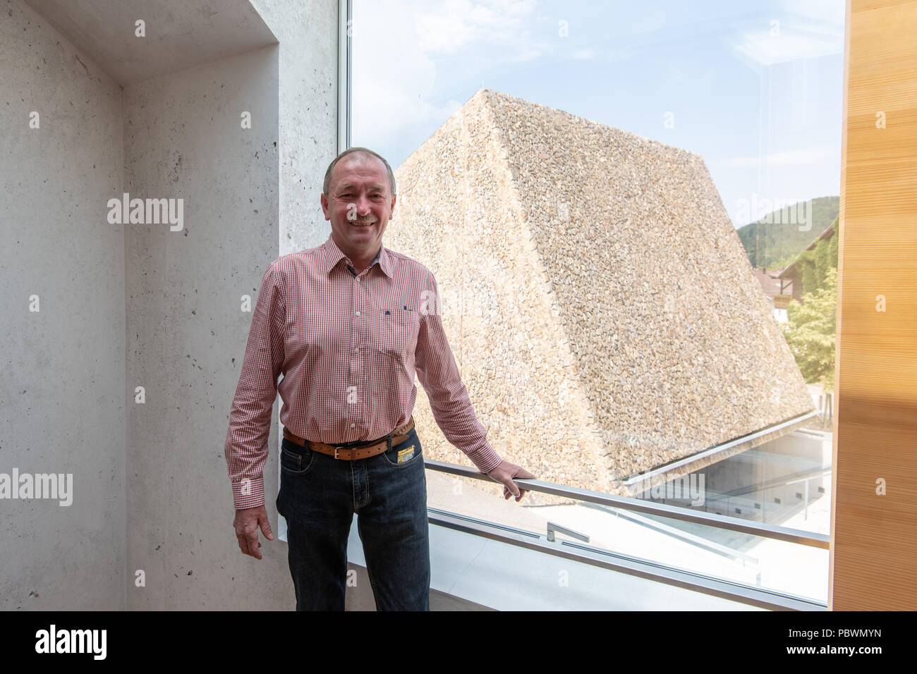 Blaibach, Germany. 26th June, 2018. Wolfgang Eckl, mayor of Blaibach, stands in front of the concert hall. Credit: Armin Weigel/dpa/Alamy Live News Stock Photo