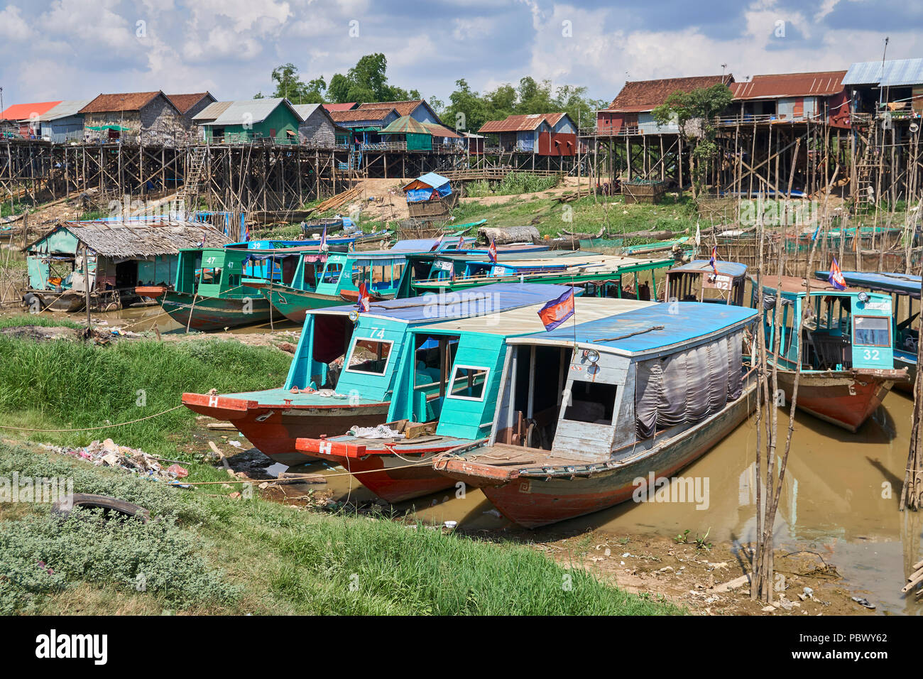 Stilt houses and boats on Tonle Sap lake in Cambodia Stock Photo