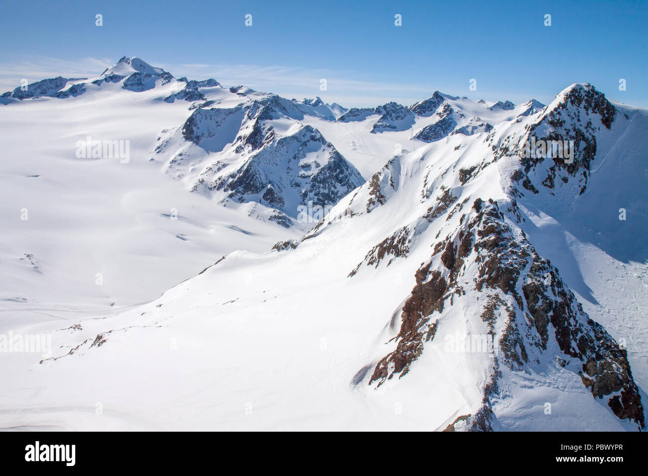 Winter snow covered mountain peaks Austrian alps Stock Photo