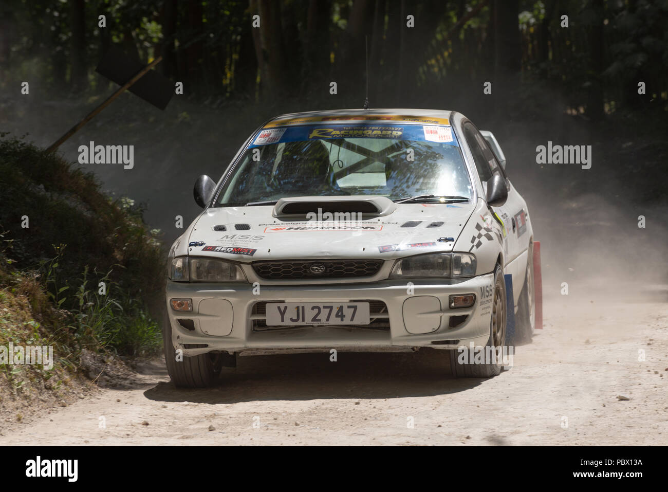 Subaru Impreza rally car on the forest stages at the Goodwood Festival of Speed 2018 Stock Photo