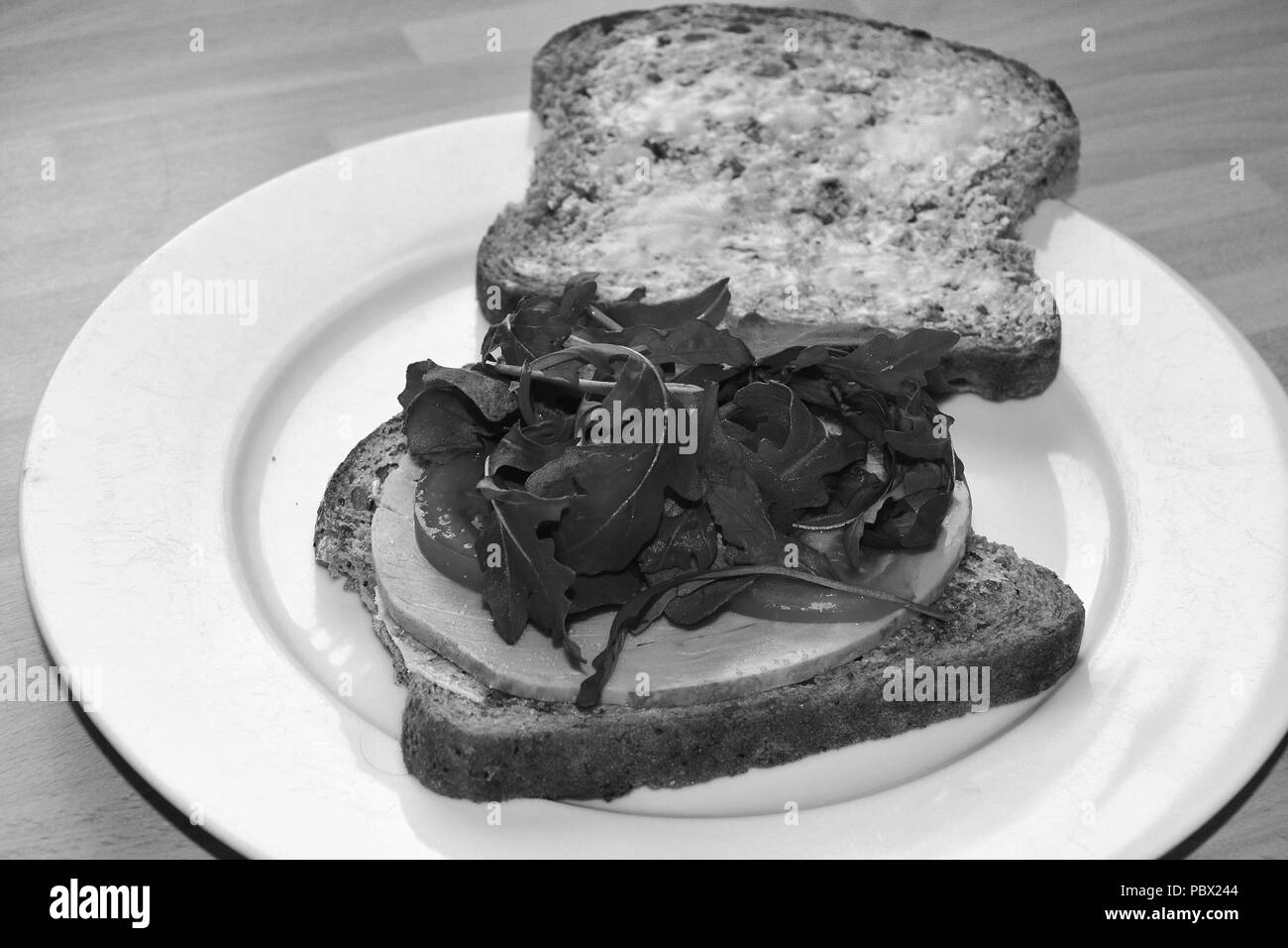 ham sandwich on whole grain brown bread Stock Photo