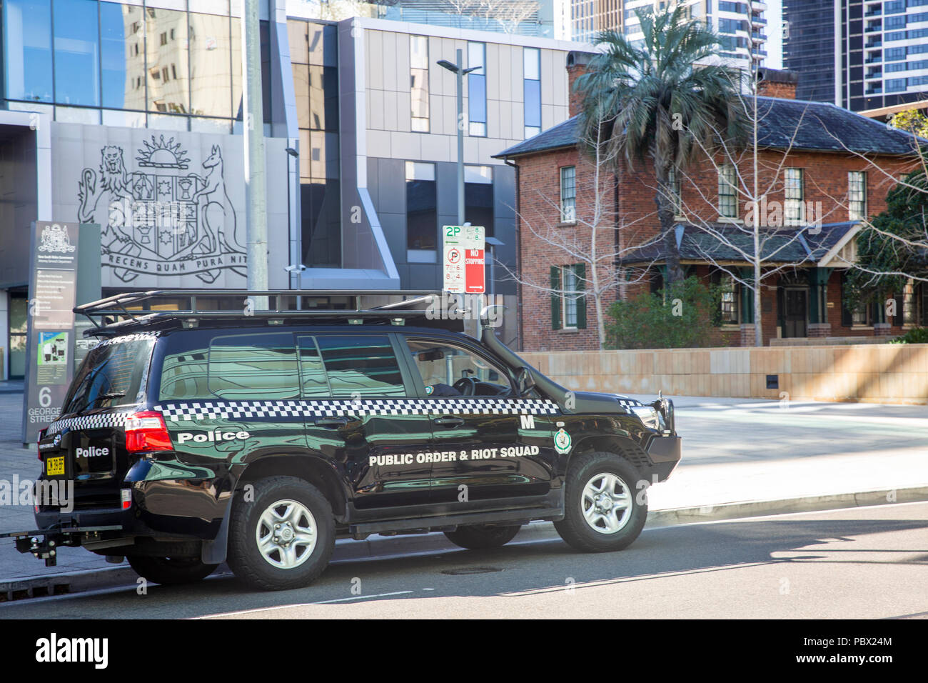 New South Wales Public order and riot squad police in a parked toyota in Parramatta city centre,Western Sydney,Australia Stock Photo