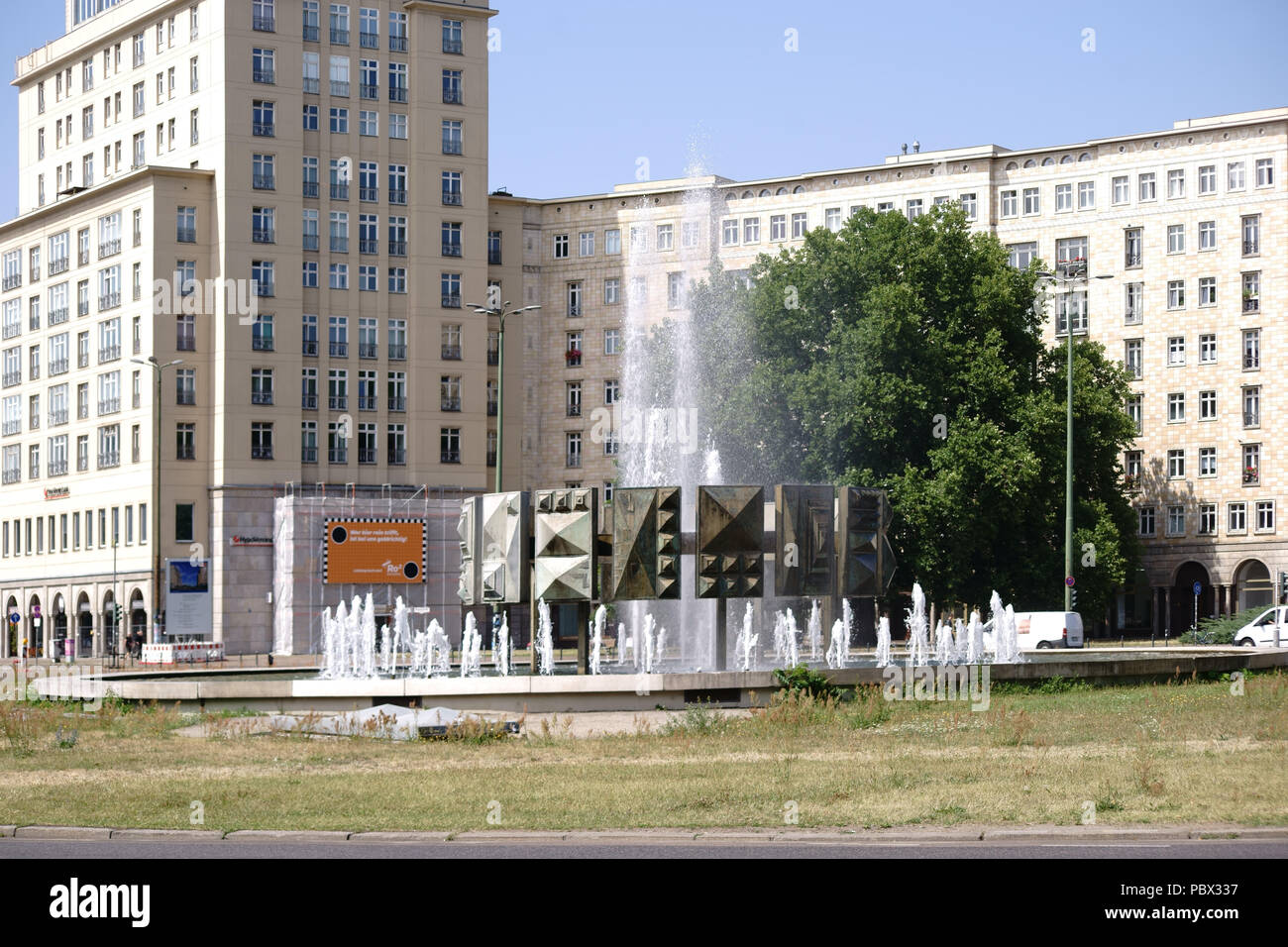 Berlin, Germany - July 13, 2018: The water of the fountain Schwebender Ring on the Strausberger Square and at Karl-Marx-Alley on July 13, 2018 in Berl Stock Photo
