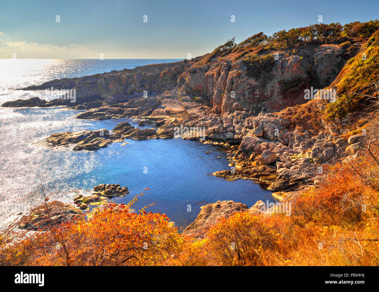 Beautiful landscape on rocky shore Stock Photo - Alamy