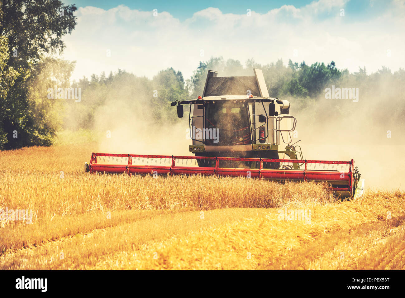 Yellow combine harvester hires stock photography and images Alamy