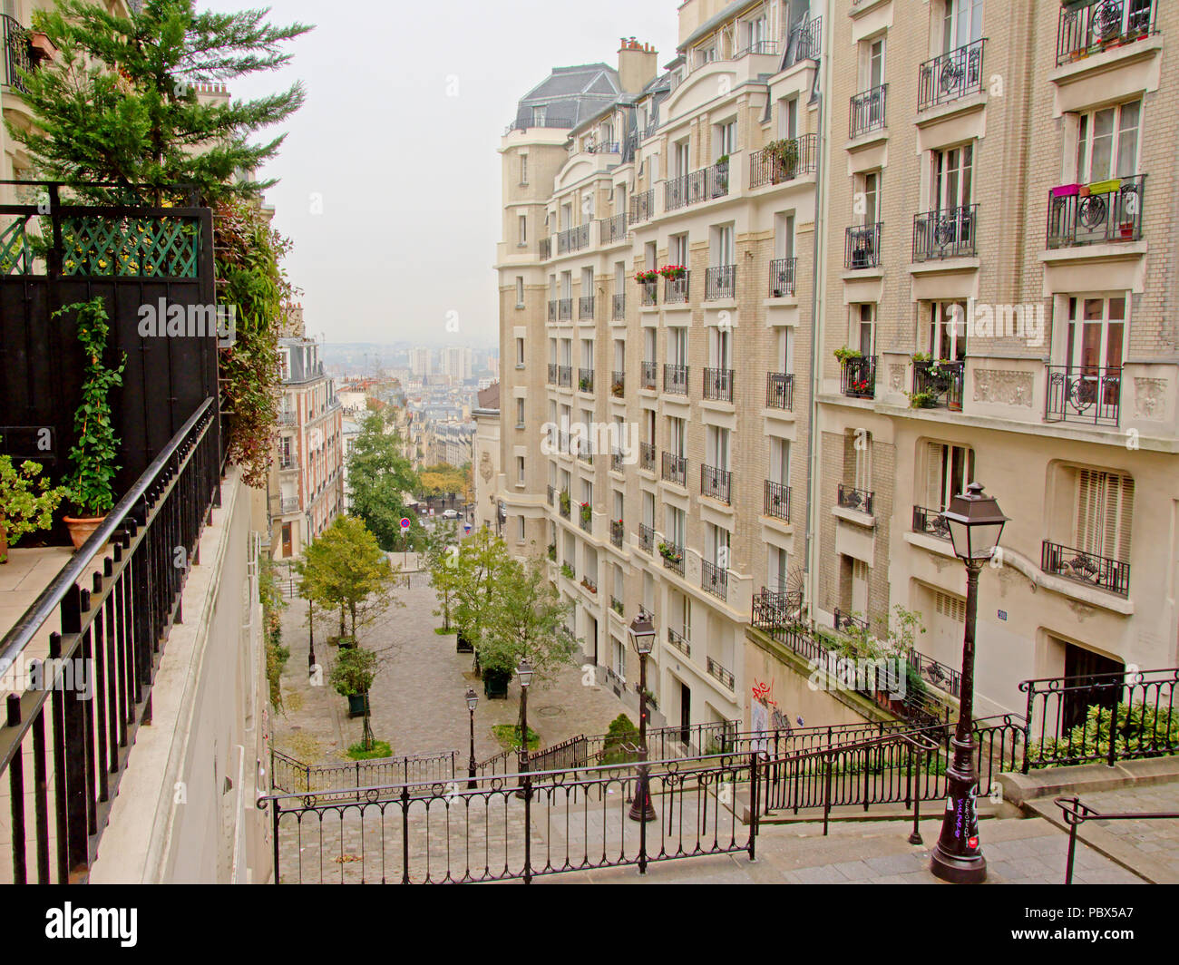 Staircase on Montmartre hill, with apartment buildings beside in Paris