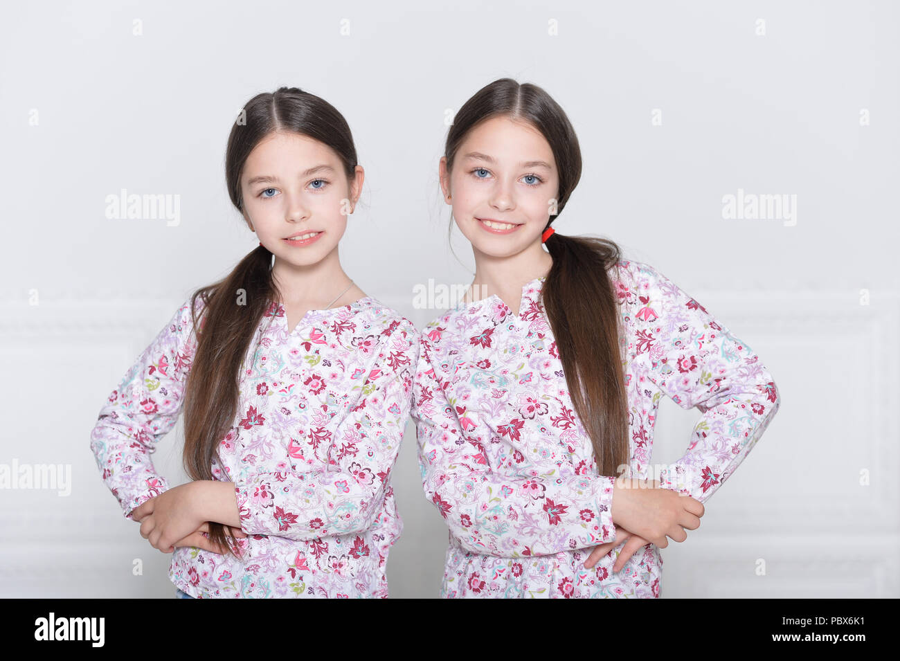 cute little girls posing  Stock Photo