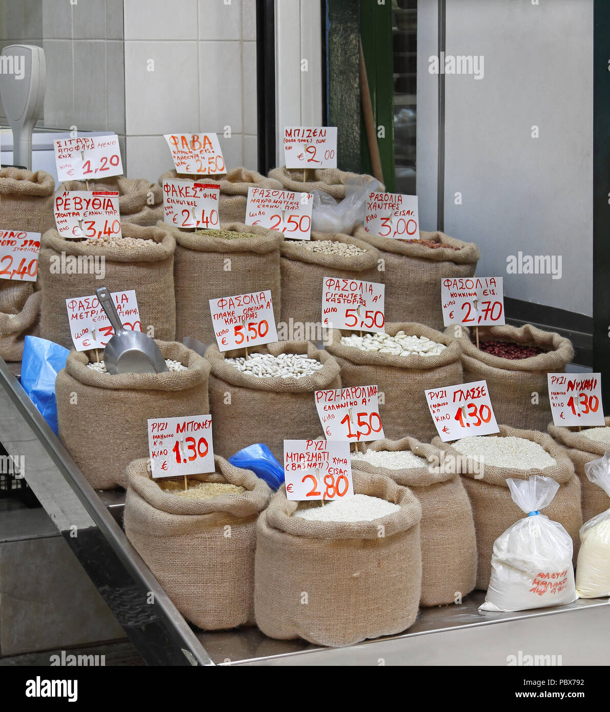 Rice and beans in sacks at market Stock Photo - Alamy
