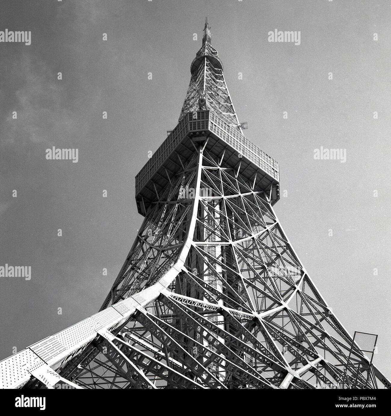 1958, historical, view from below of the recently built Tokyo tower, a tall  - over a 1,000 feet (333 metres) high- telecommunications and observation  tower, Tokyo, Japan. A steel lattice towe, based