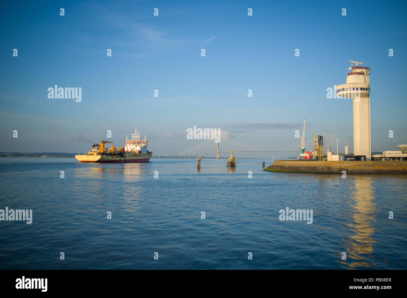 An oil tanker passes the cruise terminal at Honfleur, Normandy, France ...