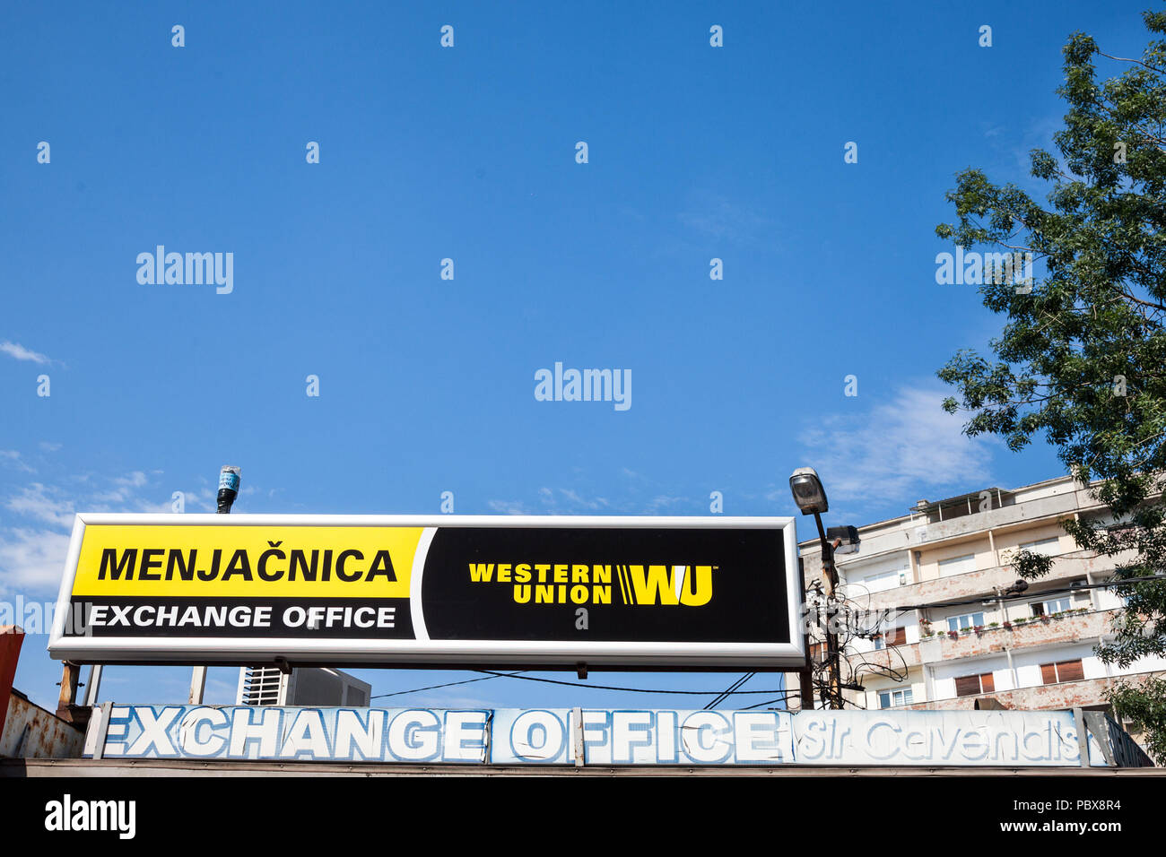 BELGRADE, SERBIA - JULY 11, 2018: Western Union logo on their main exchange office for Belgrade. The Western Union Company is an American financial se Stock Photo
