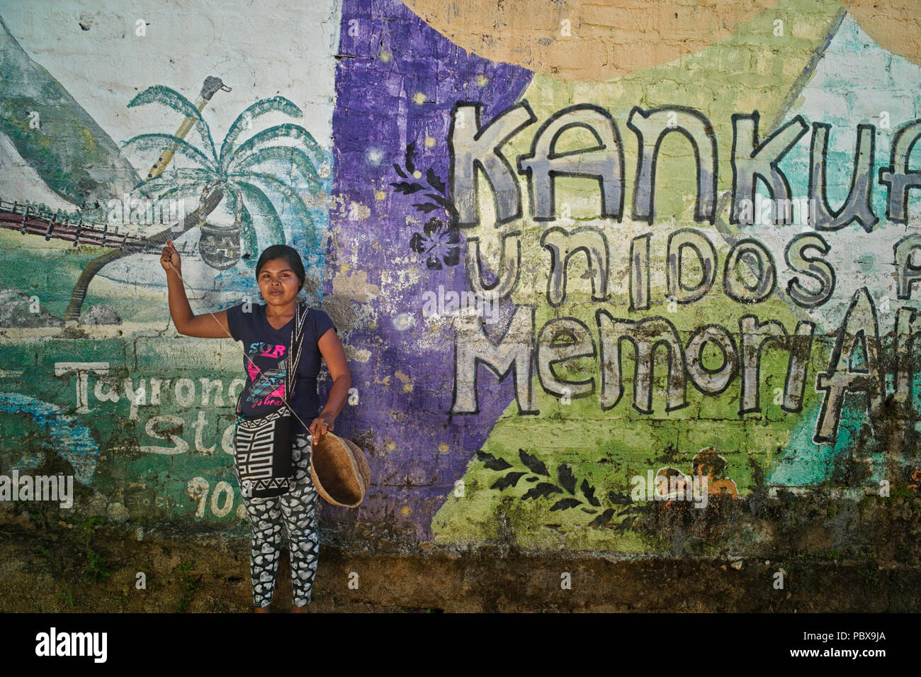 Kankuamo indigenous woman knitting using fique fiber, also known as maguey, creating the iconic kankuamo bags Stock Photo