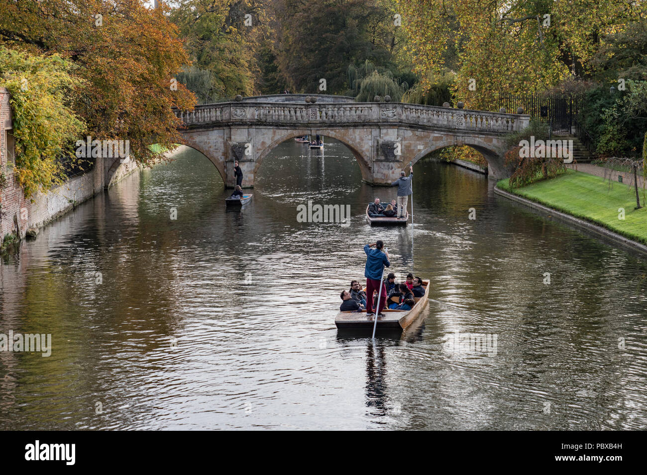 Cambridge visitors in punts on the River Cam in Cambridge, England UK. Stock Photo