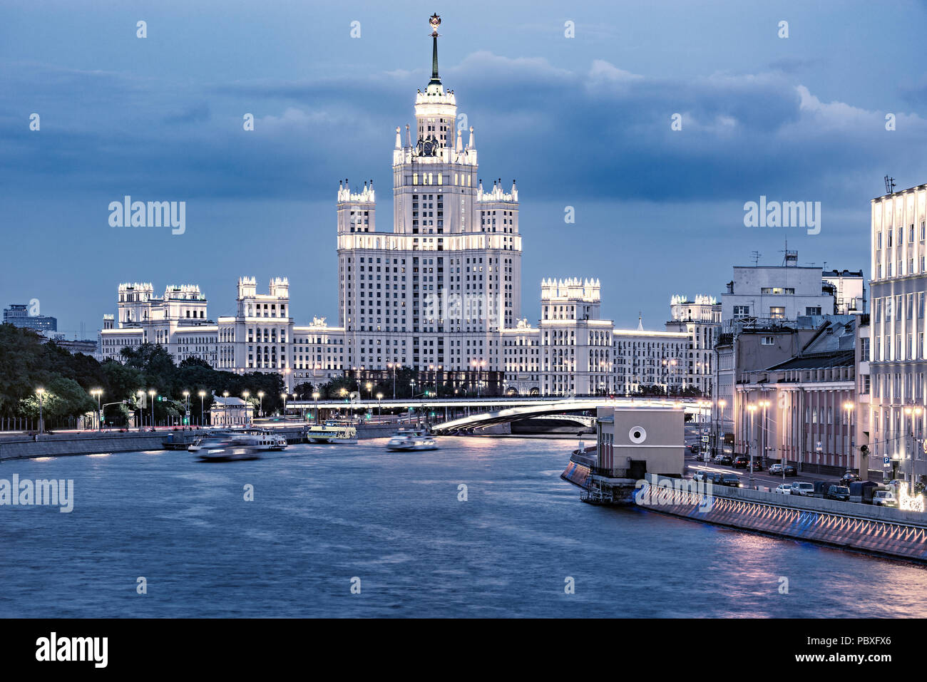 Retro skyscraper on Kotelnicheskaya embankment by Moscow river at sunset time. Moscow. Russia. Stock Photo