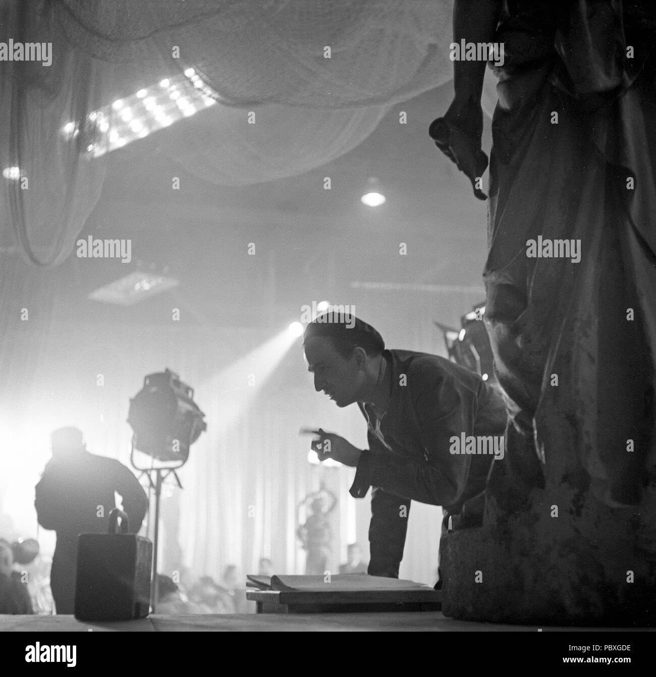 Ingmar Bergman. 1918-2007.  Swedish film director. Pictured when directing his film Waiting Women 1952. Photographer: Kristoffersson/BF55-12 Stock Photo