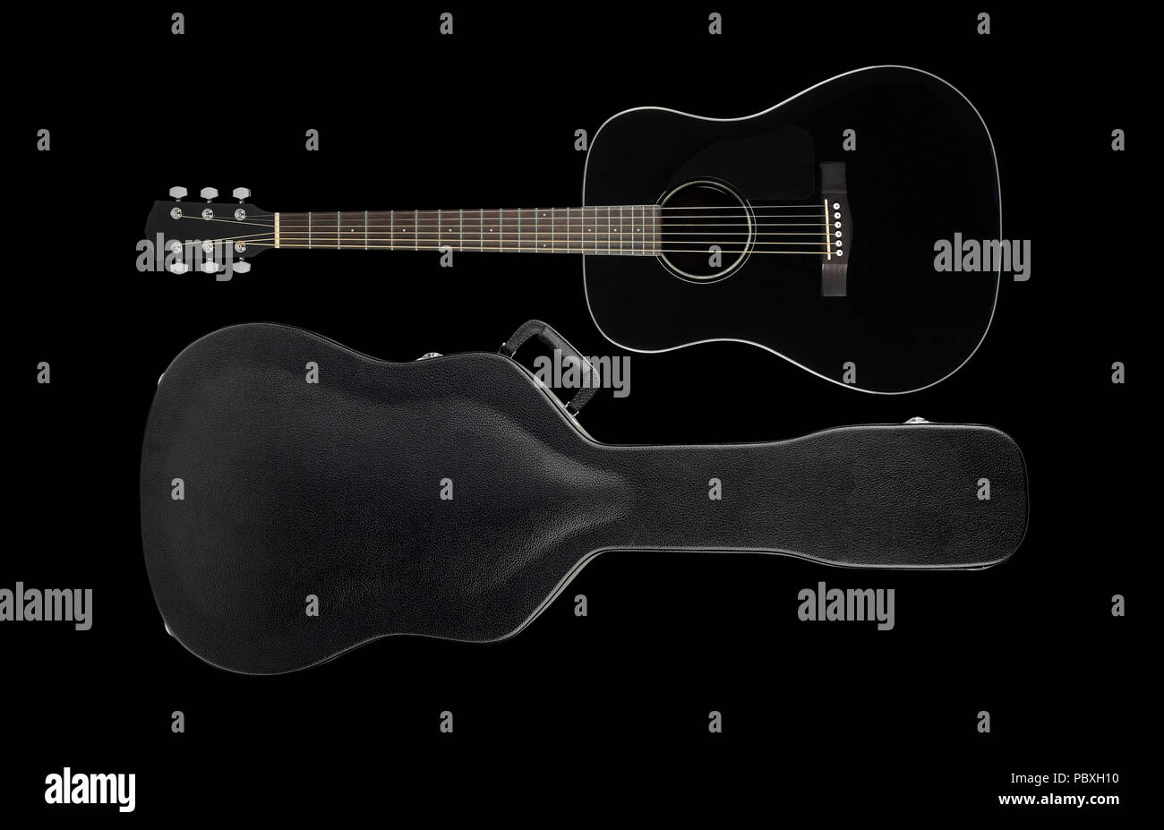 Musical instrument - Acoustic westarn guitar hard case isolated on a black background. Stock Photo