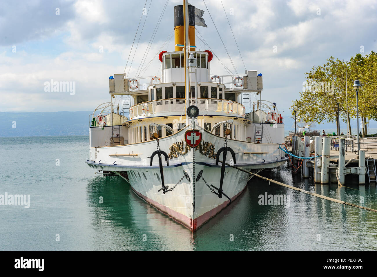 A paddle steamer, a unique and modern restored steamboat as commuter passenger ferry on Lake Geneva, Switzerland Stock Photo