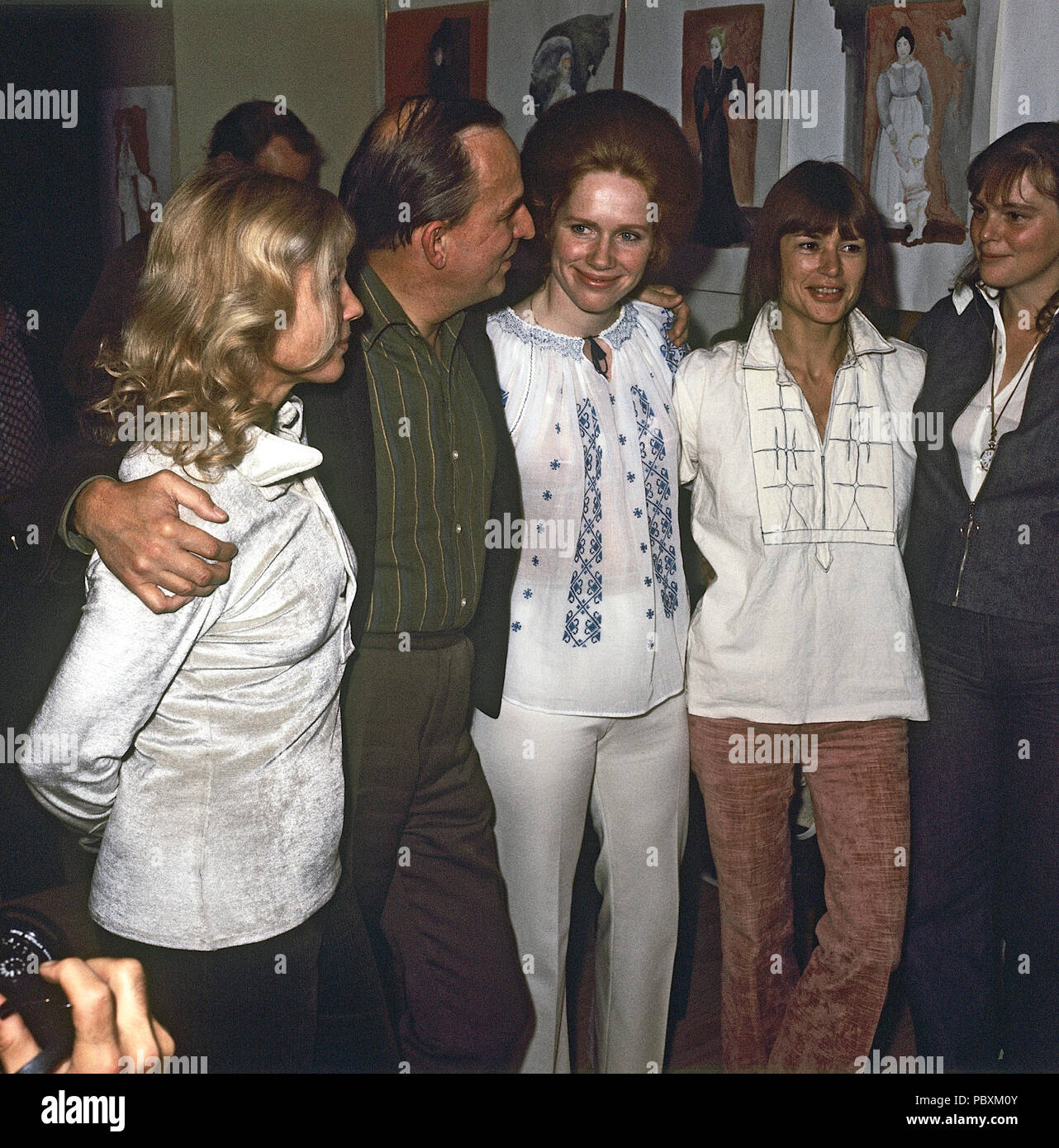 Ingmar Bergman. 1918-2007.  Swedish film director. Pictured here 1973 with the actors of his film Cries and Whispers.  Ingrid Thulin, Liv Ullmann, Harriet Andersson and Kari Sylwan. Photographer: Kristoffersson Stock Photo
