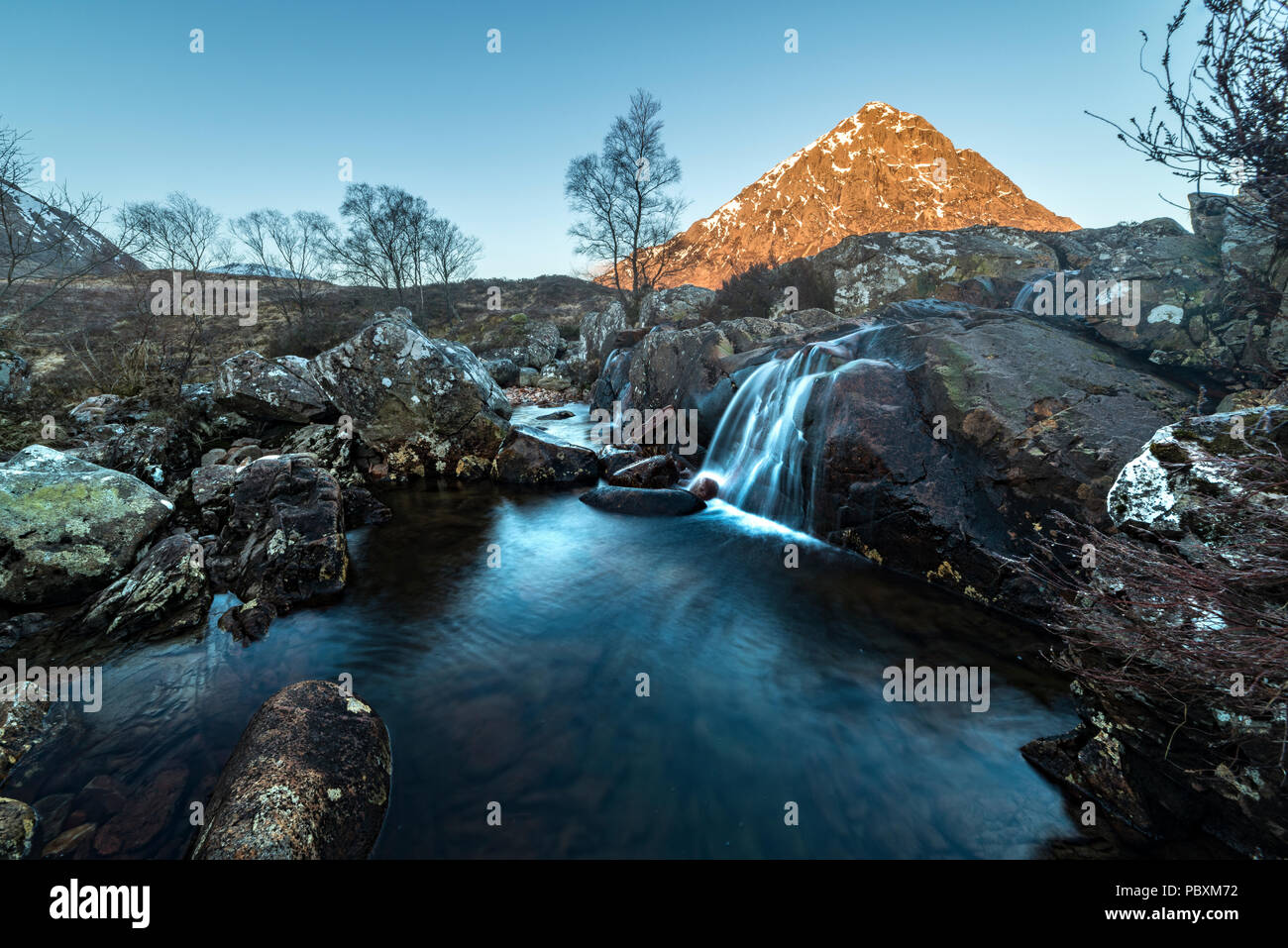 Buachaille Etive Mor Mountain and waterfall, Scotland, UK, Europe Stock Photo