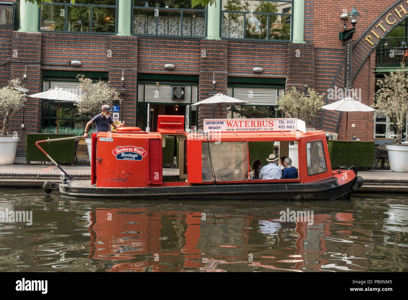 Canal boat river taxi along the beautiful and picturesque Birmingham
