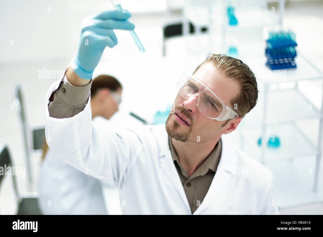 Serious scientist looks test hi-res stock photography and images - Alamy