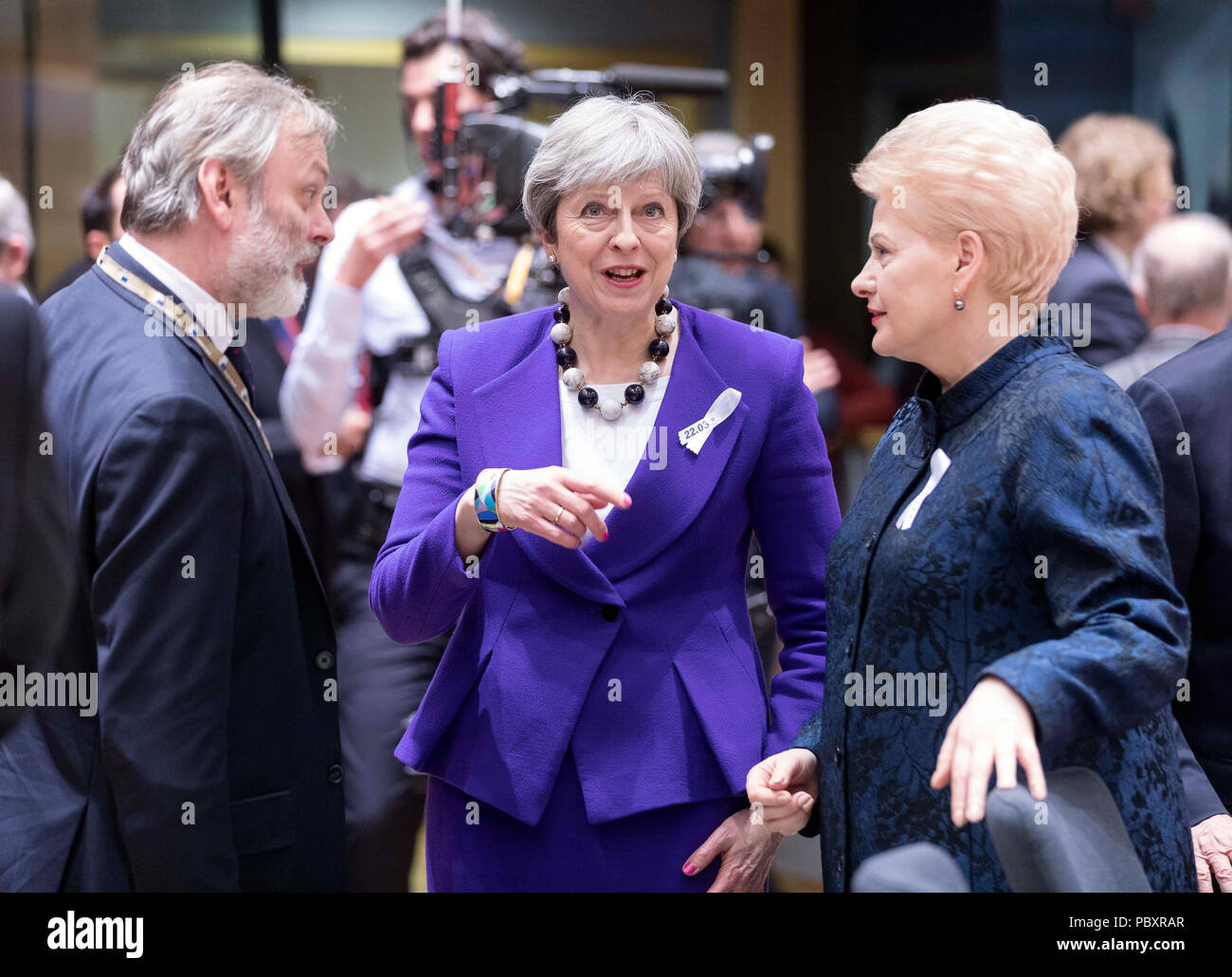 Belgium, Brussels on 2018/03/22: Summit of EU Heads of States. British Prime Minister Theresa May, Sir Timothy Earle and Dalia Grybauskaite Stock Photo
