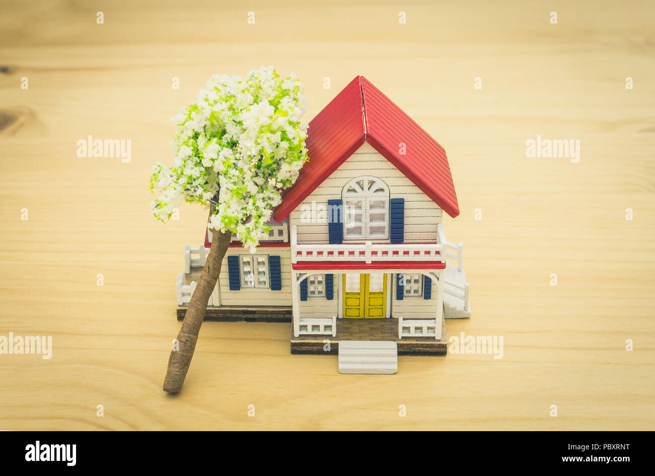 Fallen Tree Home Insurance Concept. Falling trees on home or house for