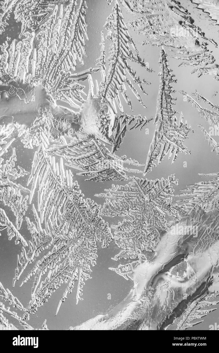 Frosty pattern at a winter window glass Stock Photo - Alamy