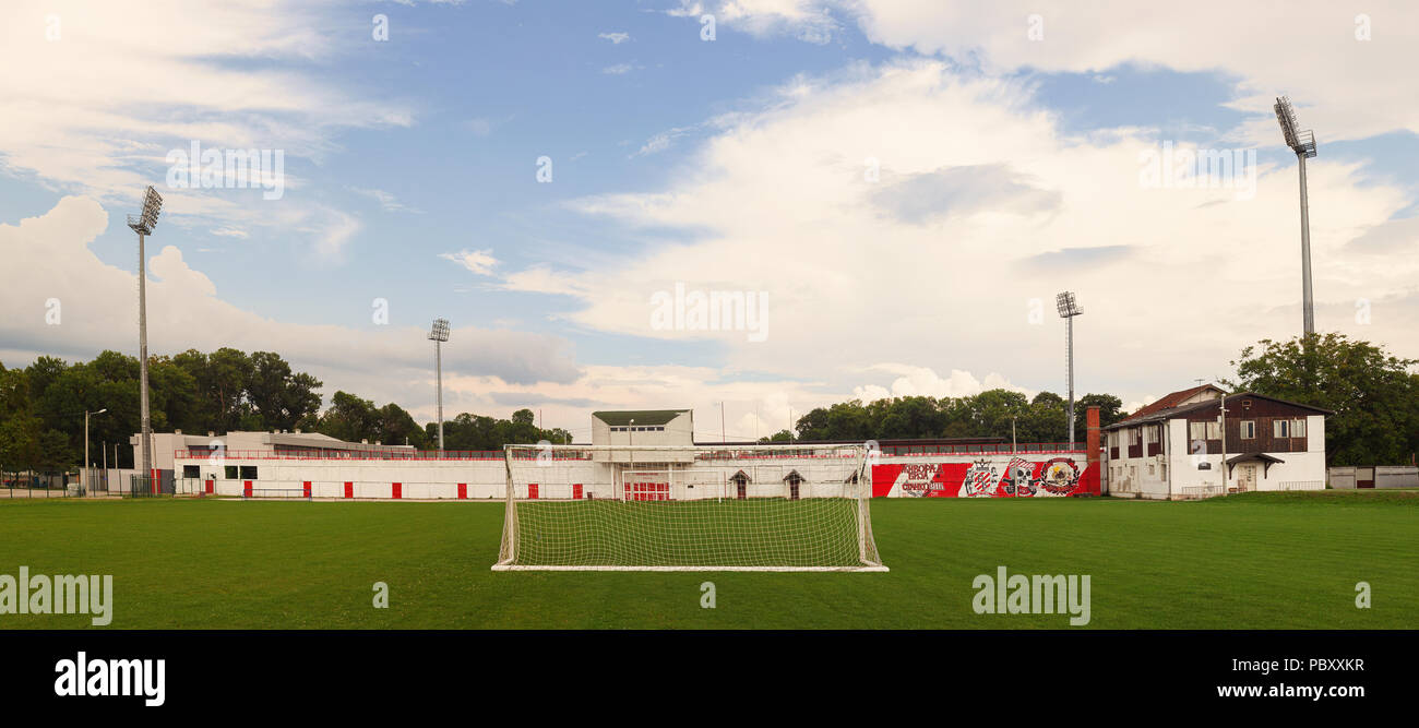 Cacak, Serbia - July 27, 2018: Subsidiary football yard of football club Borac, empty field with view on main stadium. Stock Photo