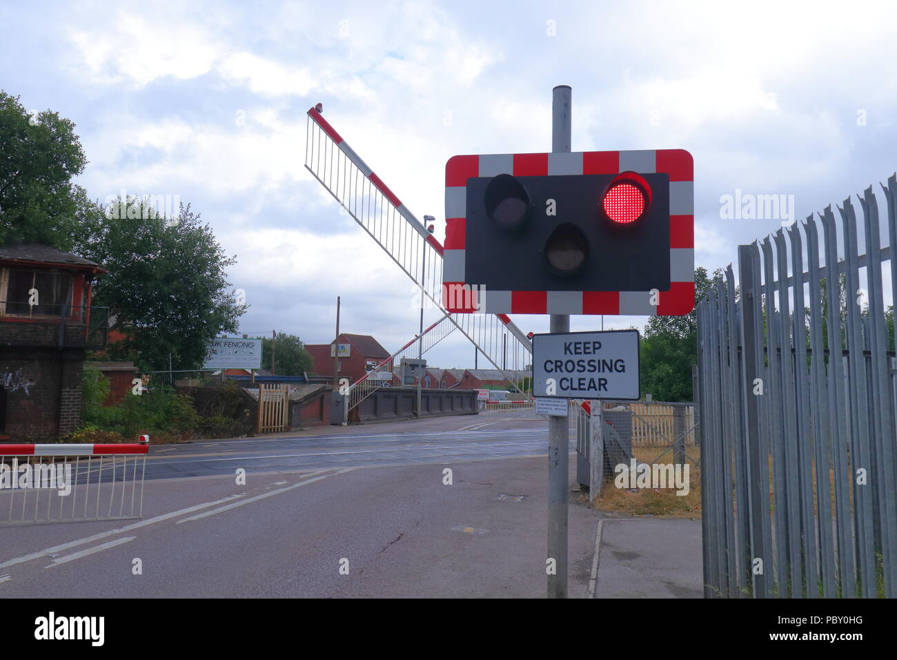 A level crossing situated between High Street & Albion Street in Castleford, West Yorkshire Stock Photo