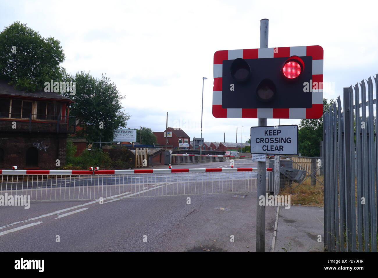 A level crossing situated between High Street & Albion Street in Castleford, West Yorkshire Stock Photo
