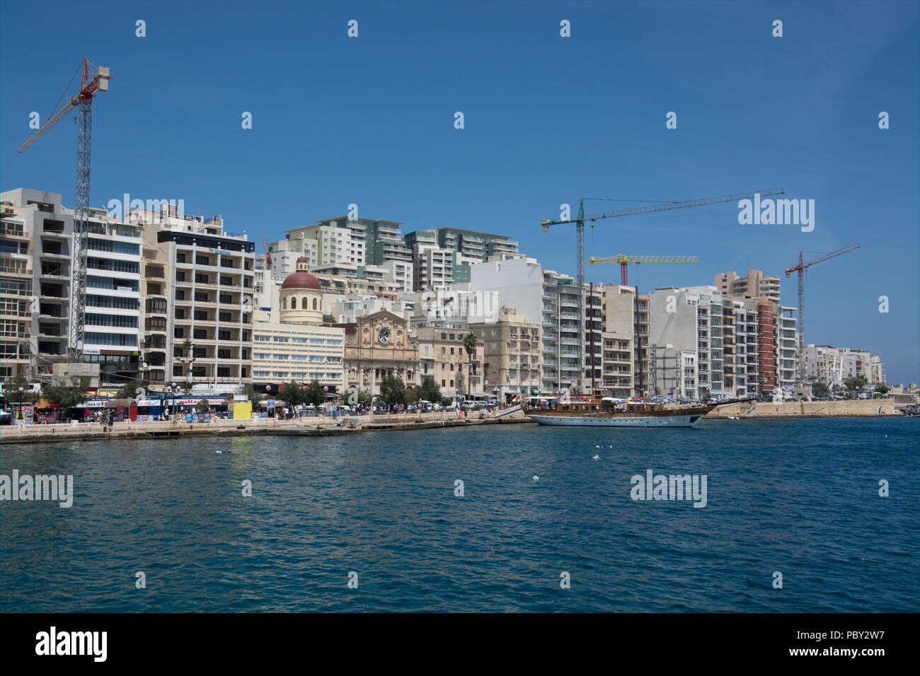 A view of the Sliema waterfront from the ferry travelling between there and Valletta Stock Photo