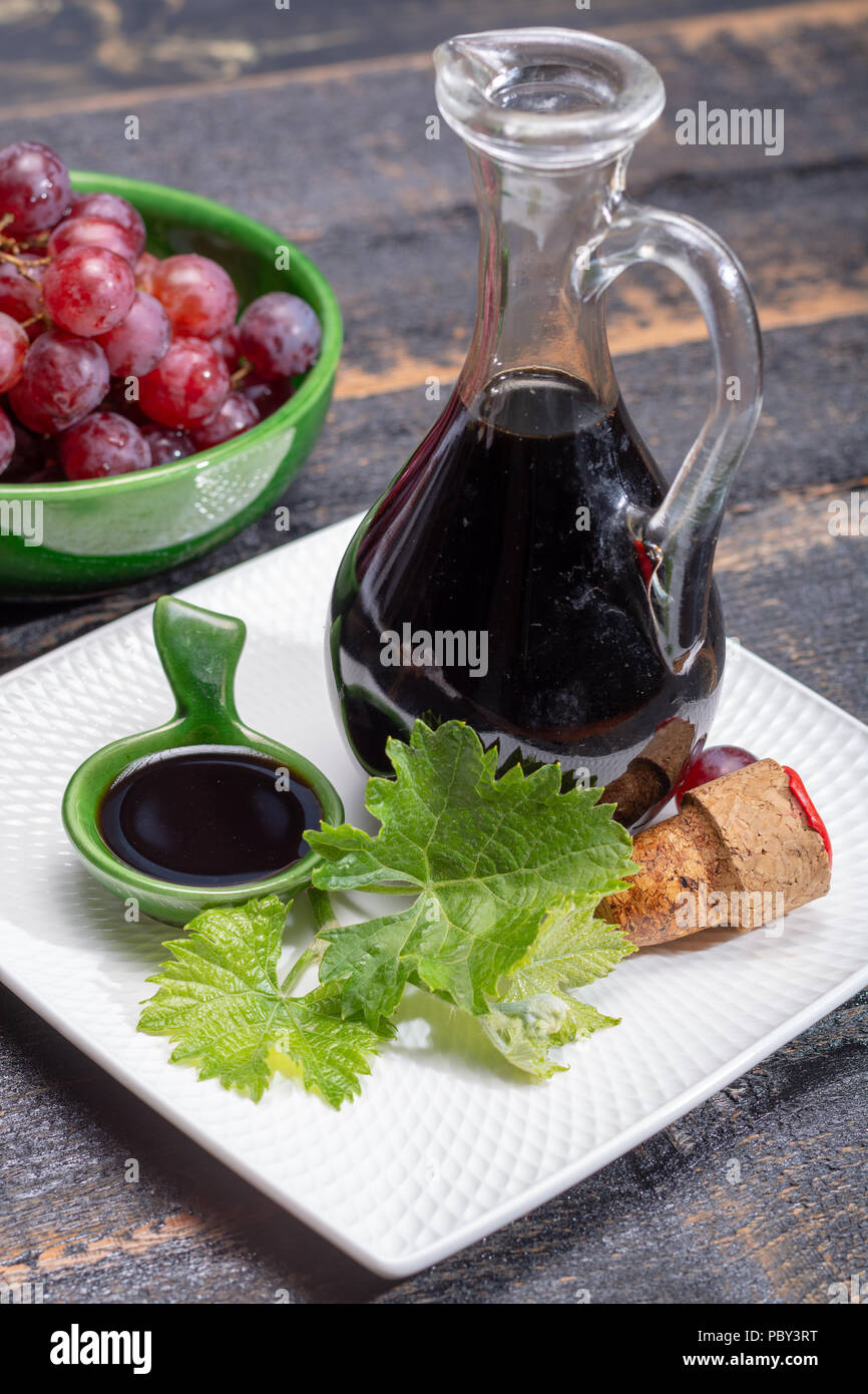 Black aged natural balsamic vinegar dressing from Modena, Italy Stock