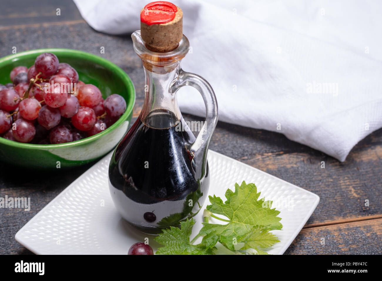Black aged natural balsamic vinegar dressing from Modena, Italy Stock