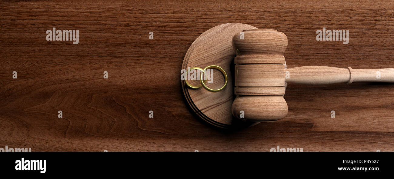 Marriage Divorce Concept Wedding Rings And Judge Gavel On Wooden