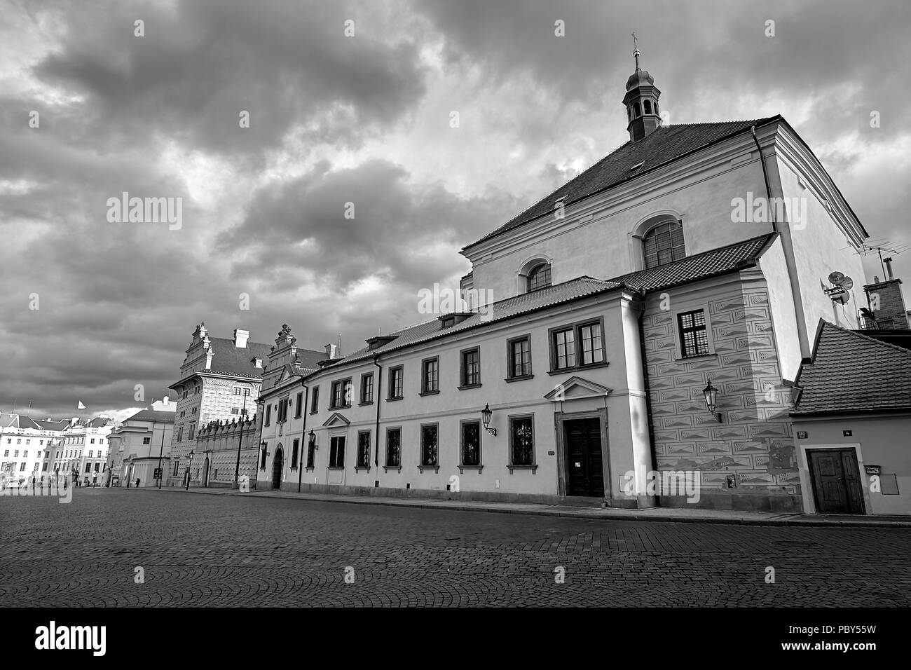 Schwarzenbersky Palace at Hradcany Square in Prague, Czech Republic. Black and white. Stock Photo