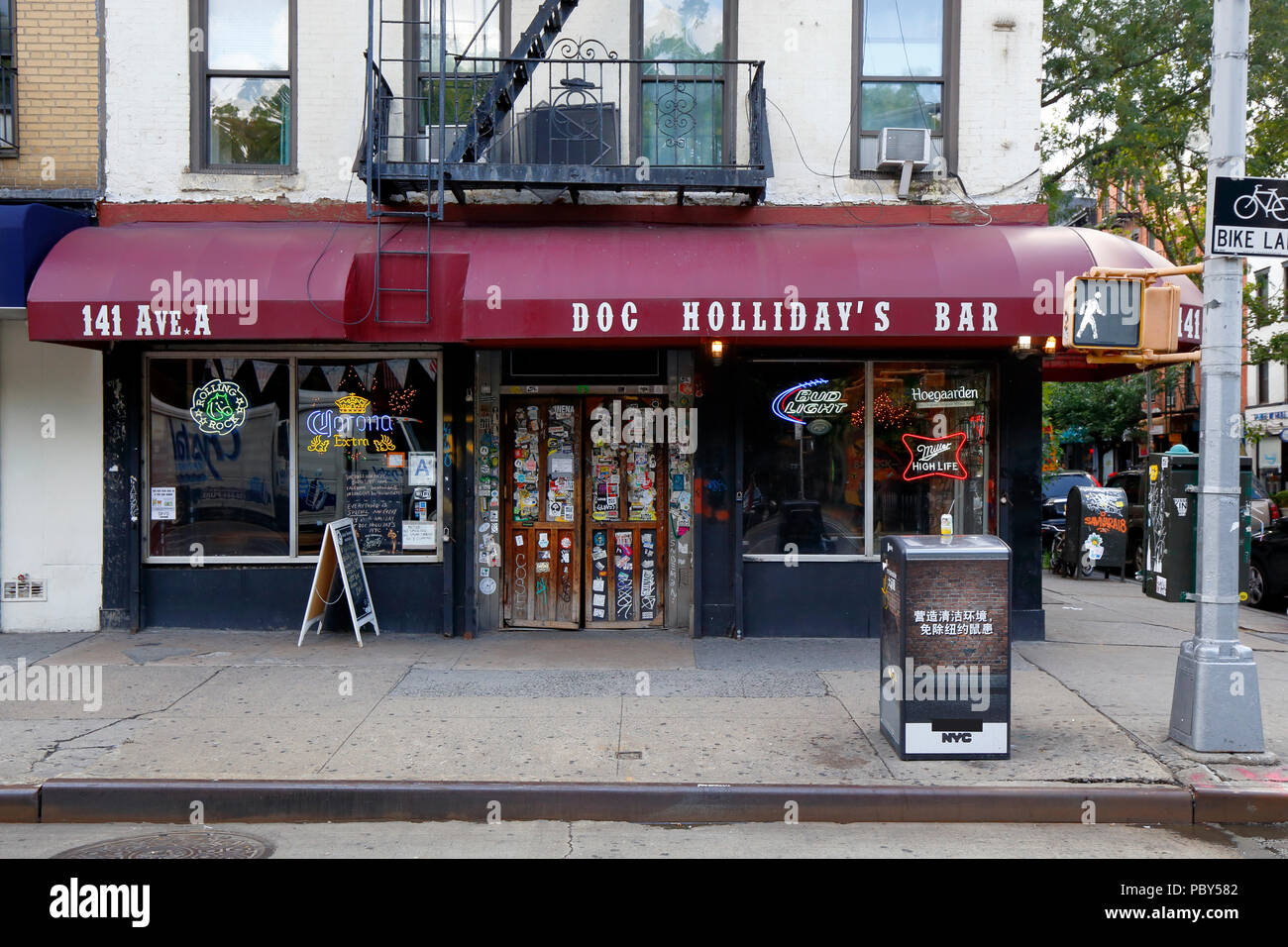 Doc Holliday's, 141 Avenue A, New York, NY. exterior storefront of a neighborhood bar in the East Village neighborhood of Manhattan. Stock Photo