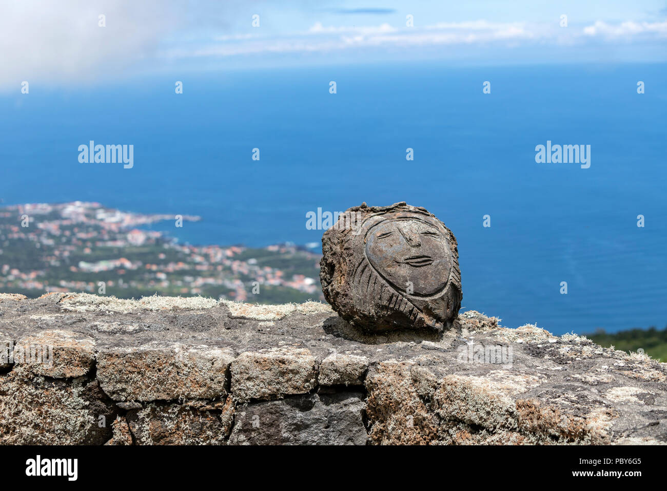 Face sculpture in volcanic stone hi-res stock photography and images ...