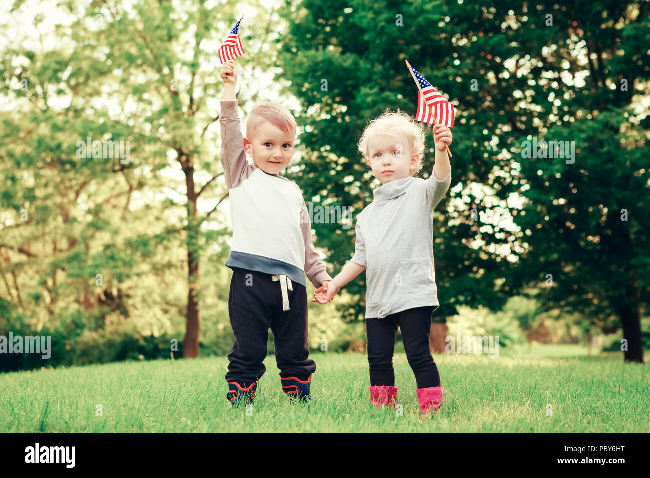 Children holding american flag hi-res stock photography and images - Alamy