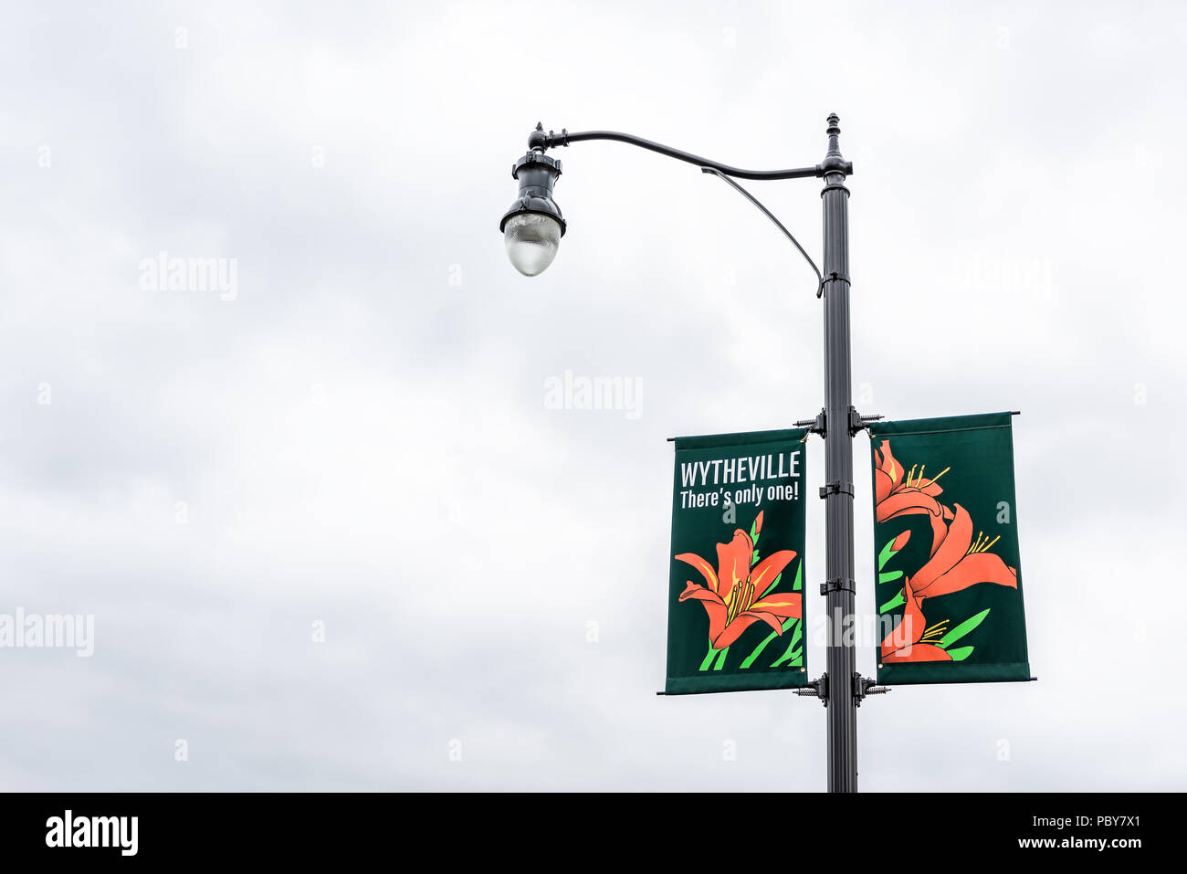 Wytheville, USA - April 19, 2018: Small town village sign on lamp post in southern south Virginia with 'there's only one' banner Stock Photo