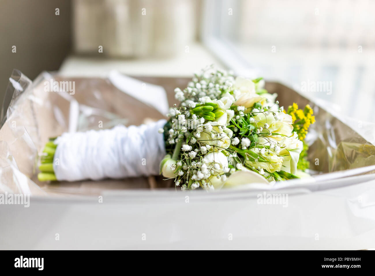 Wedding Bouquet Side In Cardboard Box On Sunny Windowsill Window Sill During Morning Day Lying In Room Of Hotel Many Flowers Green Yellow Lily Stock Photo Alamy