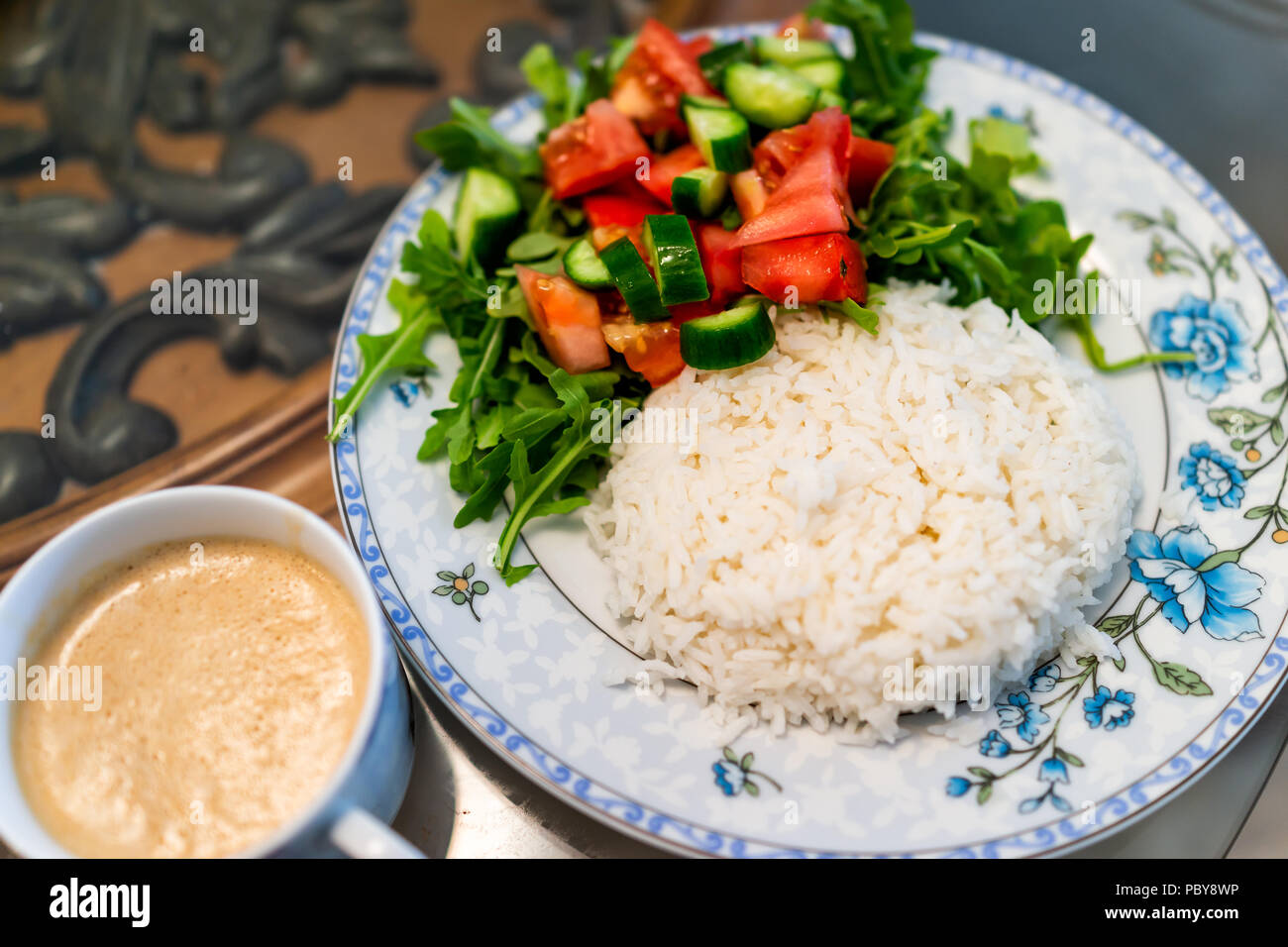 Closeup Of Plain White Jasmine Long Grain Cooked Rice With Arugula Tomato Salad On Plate Cup With Sauce Or Coffee Drink Table Healthy Vegan Diet Foo Stock Photo Alamy