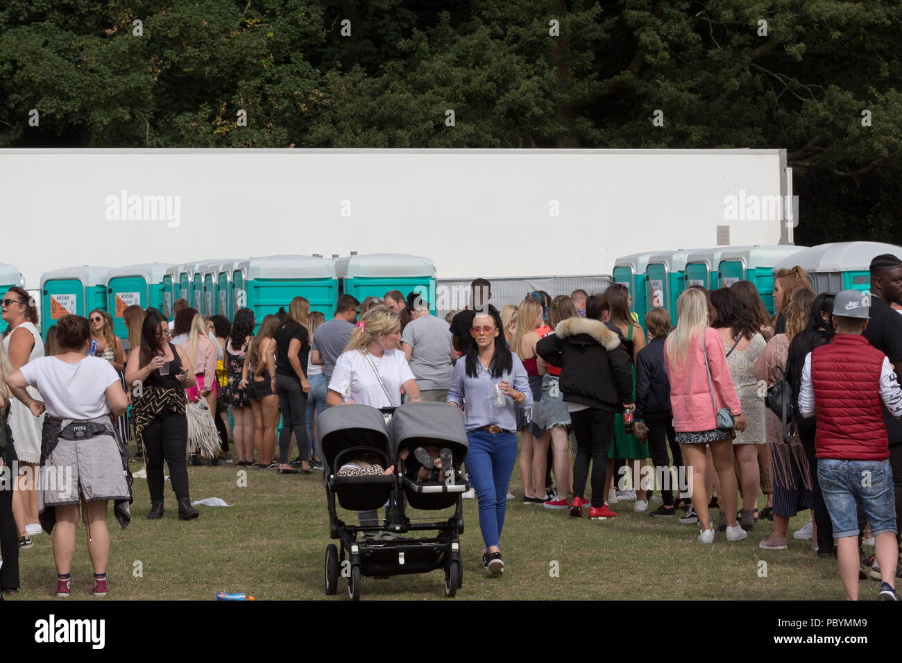 Toilet queue festival hires stock photography and images Alamy