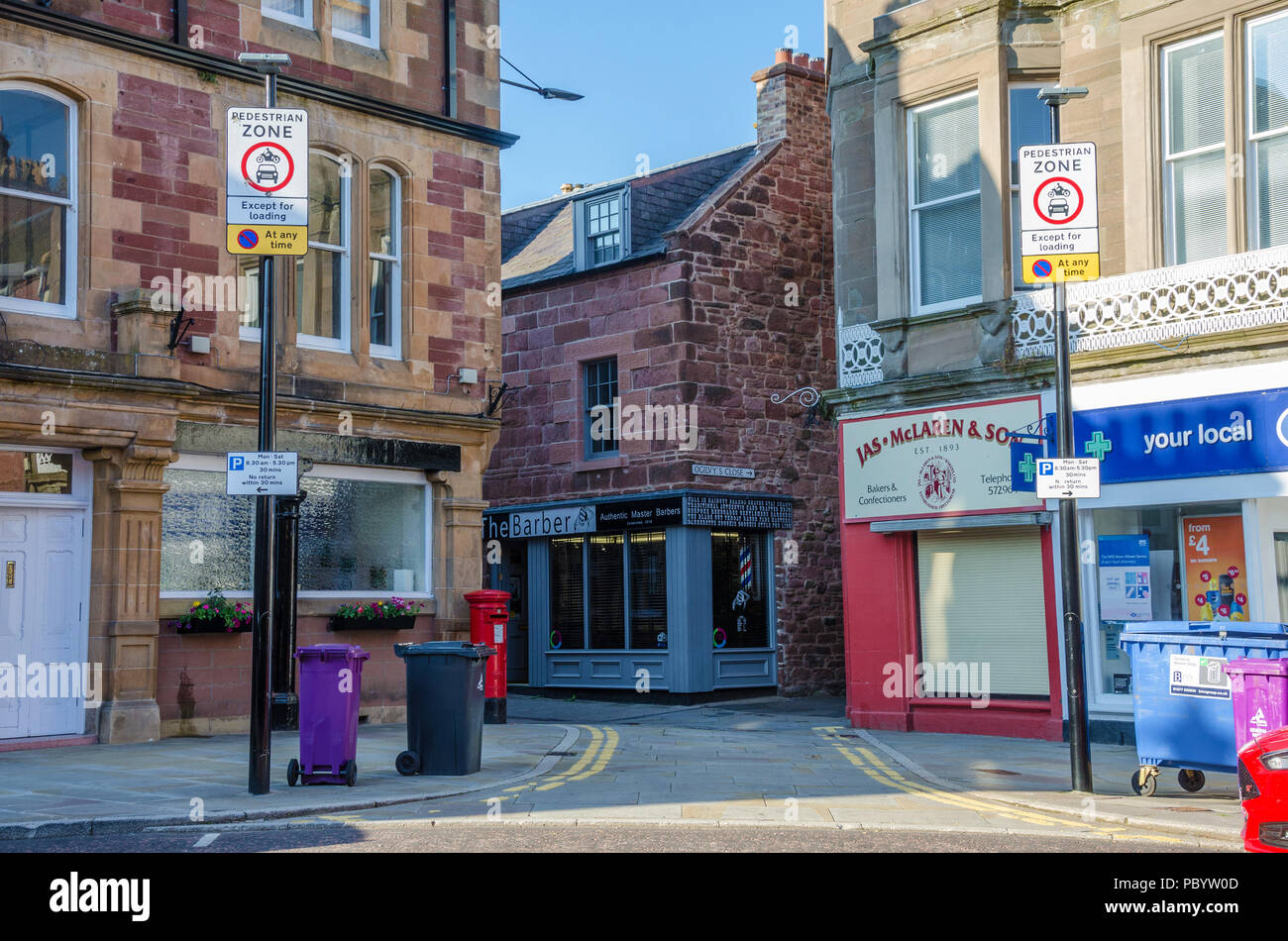 Signs giving notification of a Pedestrian Zone in Kirriemuir in Scotland, UK. Stock Photo