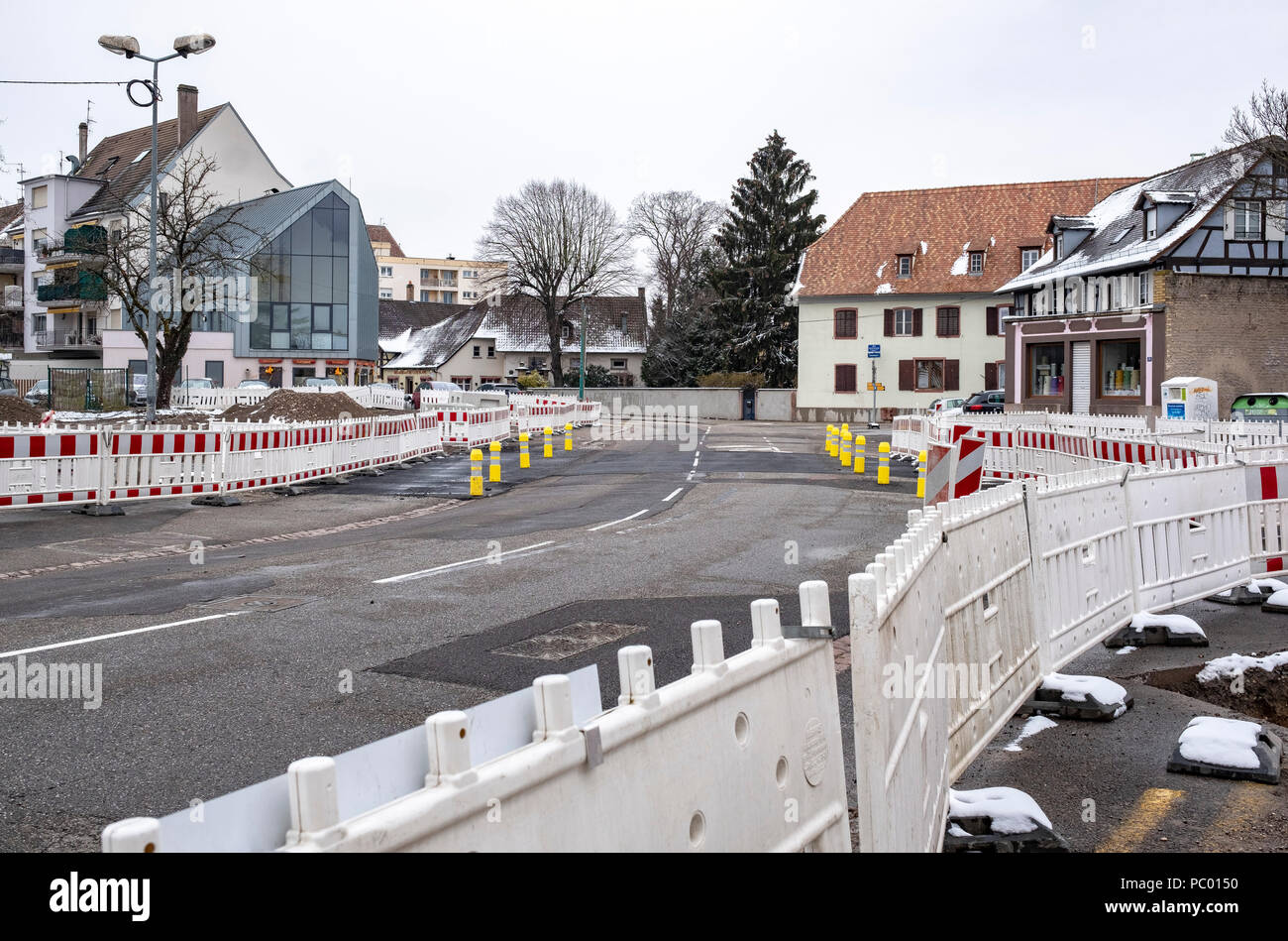 Strasbourg, preliminary tram construction site, line E extension, safety plastic barriers, bollards, street, houses, Alsace, France, Europe, Stock Photo