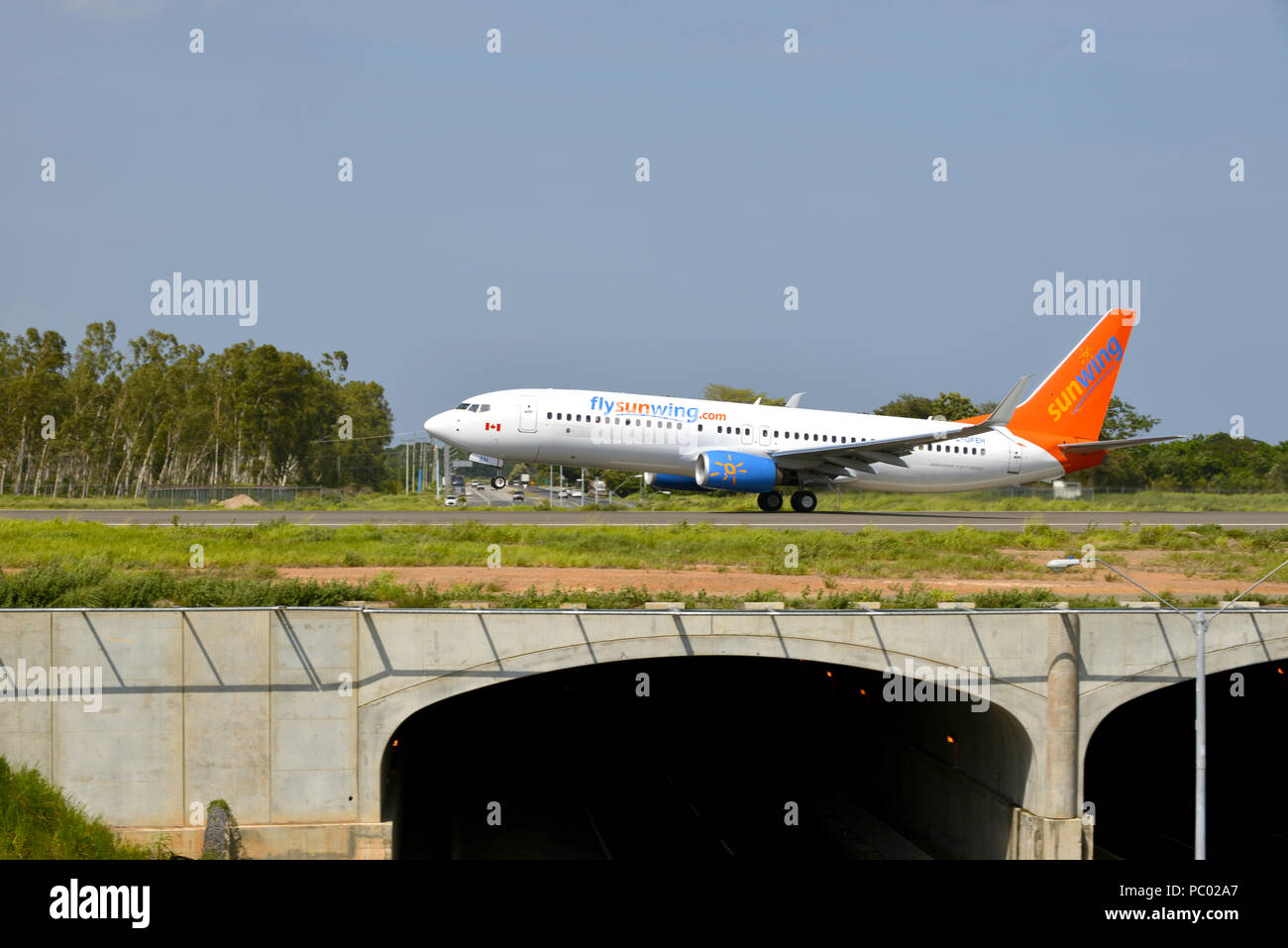 RIO HATO AIRPORT, PANAMA-JULY 3, 2015: A Sunwing Airline 737-800 jet  from Canada about to take off from the new International Airport of Rio Hato in  Stock Photo