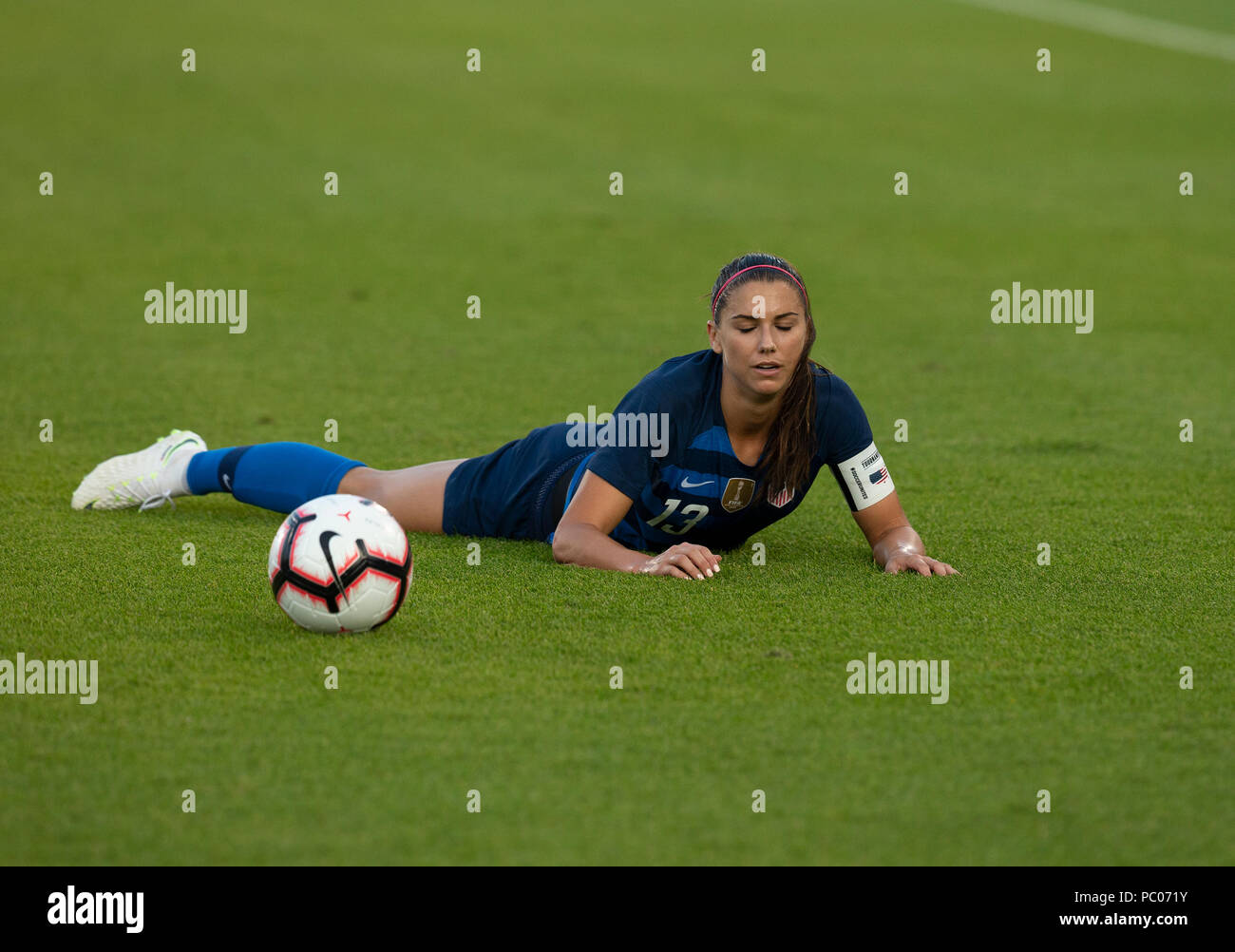 East Hartford, United States. 29th July, 2018. Alex Morgan (13) of USA taken down during Tournament of Nations game against Australia at Pratt & Whitney stadium Game ended in draw 1 - 1 Credit: Lev Radin/Pacific Press/Alamy Live News Stock Photo