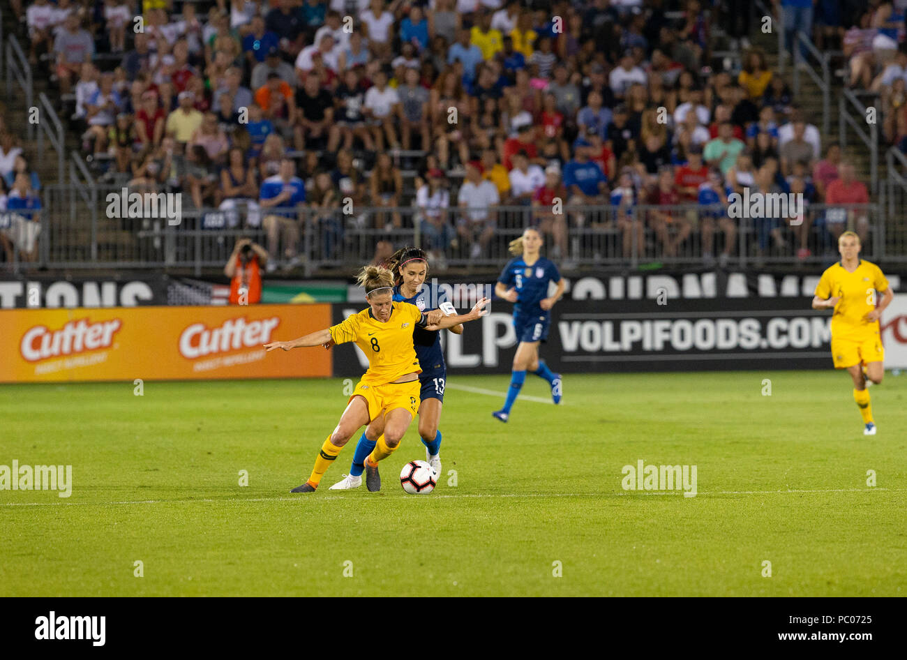 East Hartford, United States. 29th July, 2018. Alex Morgan (13) of USA and Elise Kellond-Knight (8) of Australia fight for ball during Tournament of Nations game at Pratt & Whitney stadium Game ended in draw 1 - 1 Credit: Lev Radin/Pacific Press/Alamy Live News Stock Photo