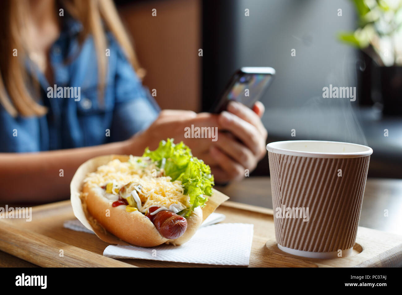 Lunch concept background. Young woman at meal time Stock Photo